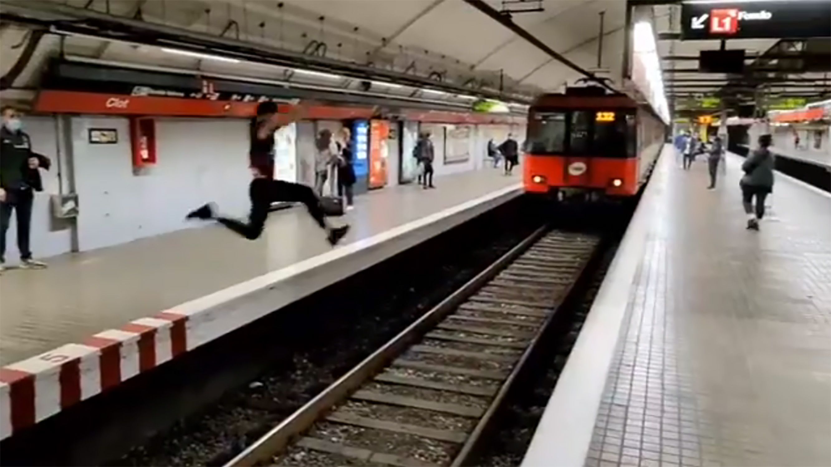 Located and charged: foolhardy Barcelona man who jumped in front of train
