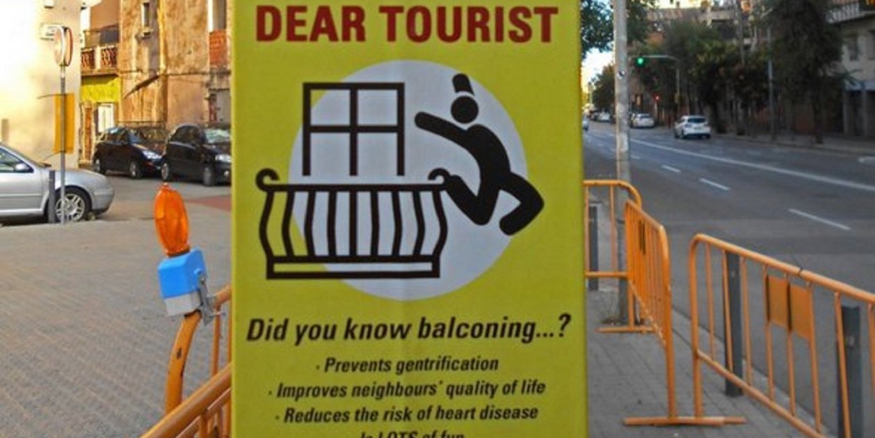 Anti-tourist 'balconing' posters appear around Barcelona