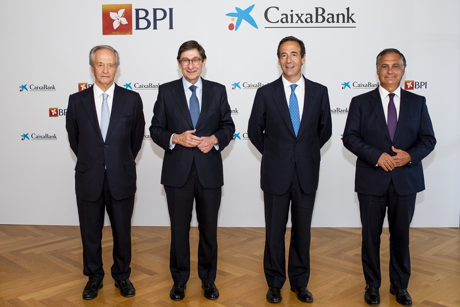 Los presidentes y consejeros delegados de BPI y grupo CaixaBank