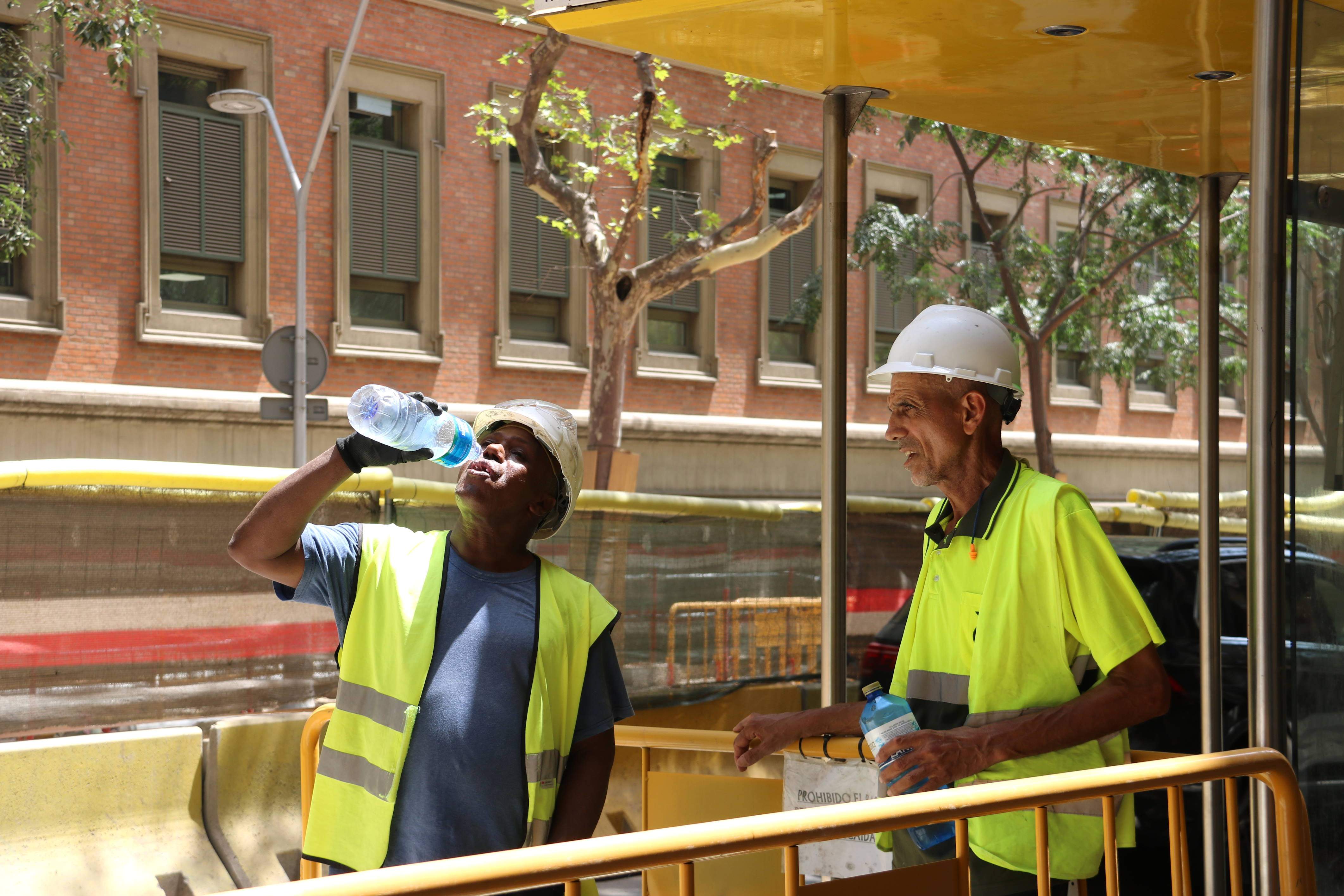 Trabajadores en pleno verano. ACN