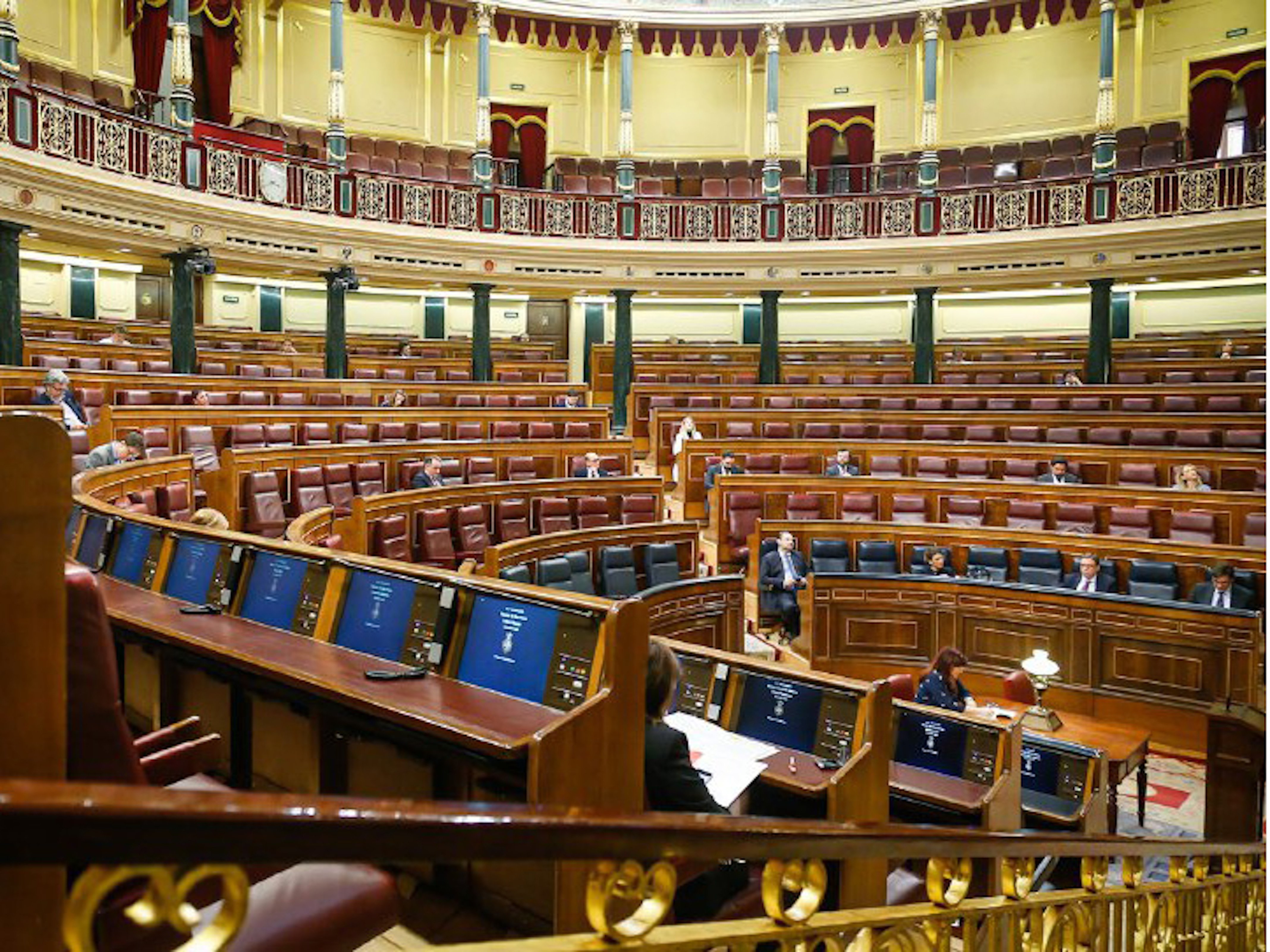 An almost-empty parliament extends Spain's state of alarm in late-night vote