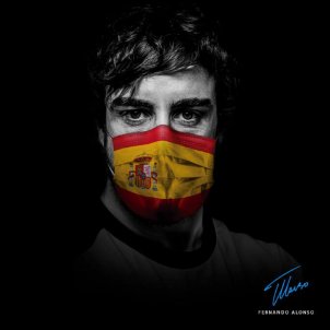 Fernando Alonso bandera espanya mascareta Foto Accion contra el hambre