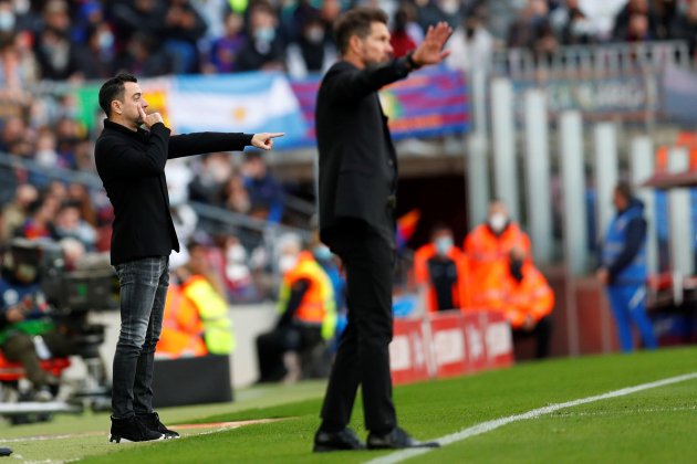 xavi hernandez cholo simeone fc barcelona atletico efe xavi hernandez cholo simeone fc barcelona atletico efe
