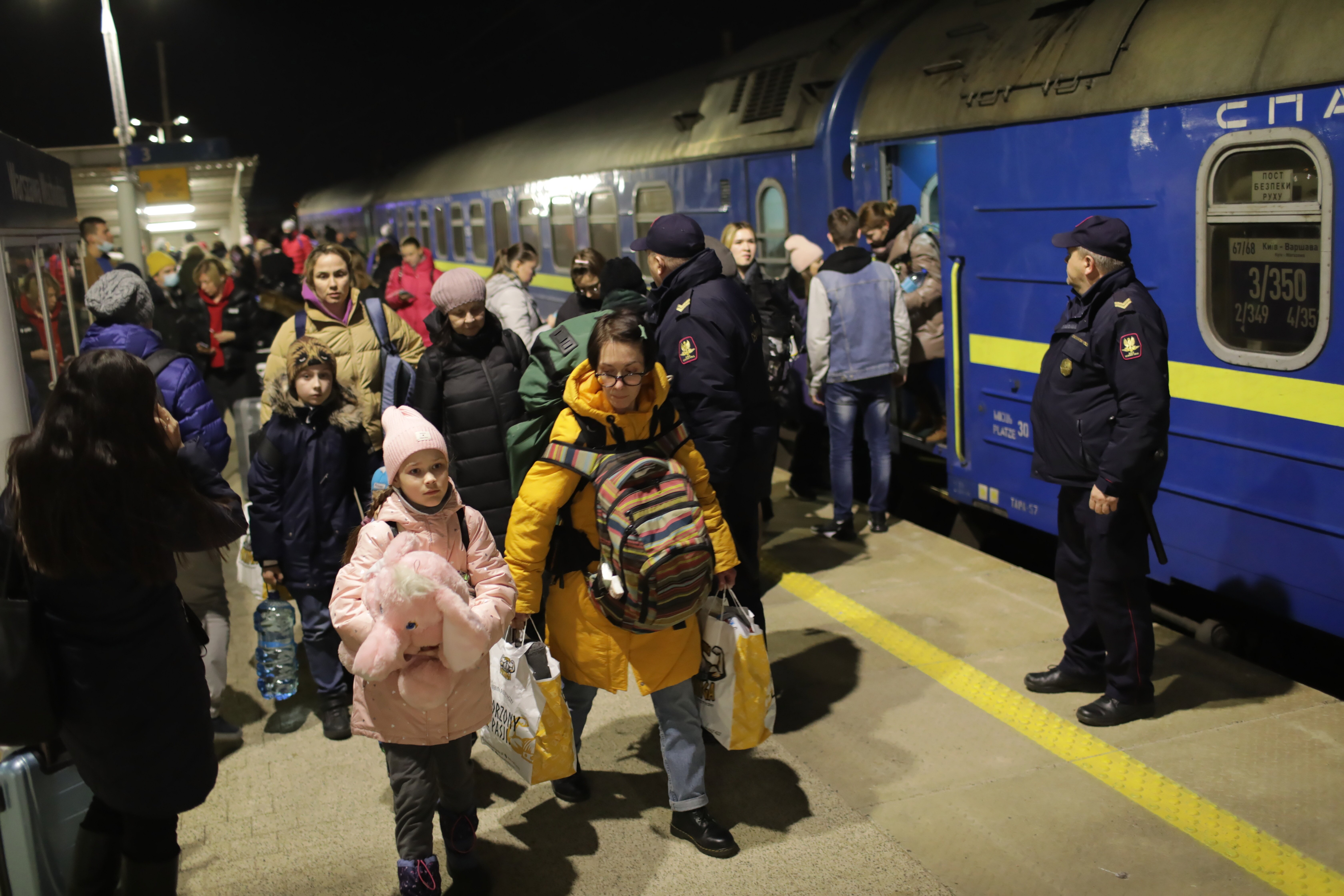 Refugiados polacos llegan a Varsovia Efe