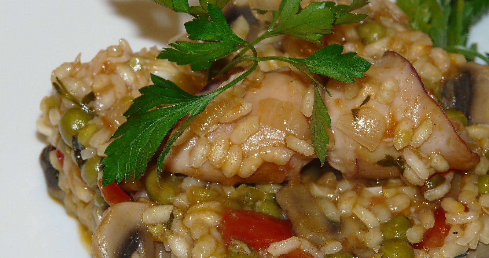 Arroz con bacalao, calamar y champiñones