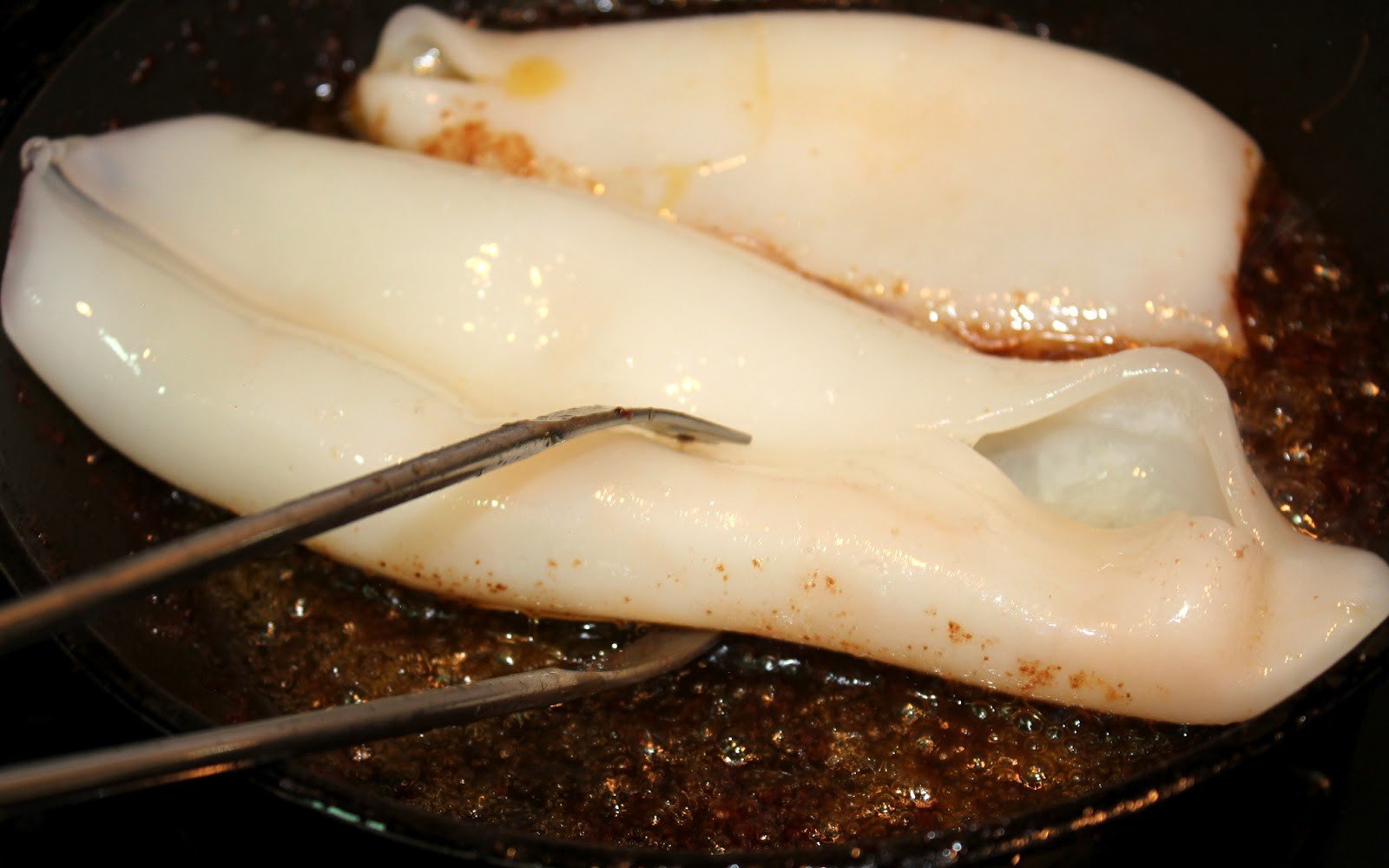 calamars sobre tagliata salsa gamba pas10