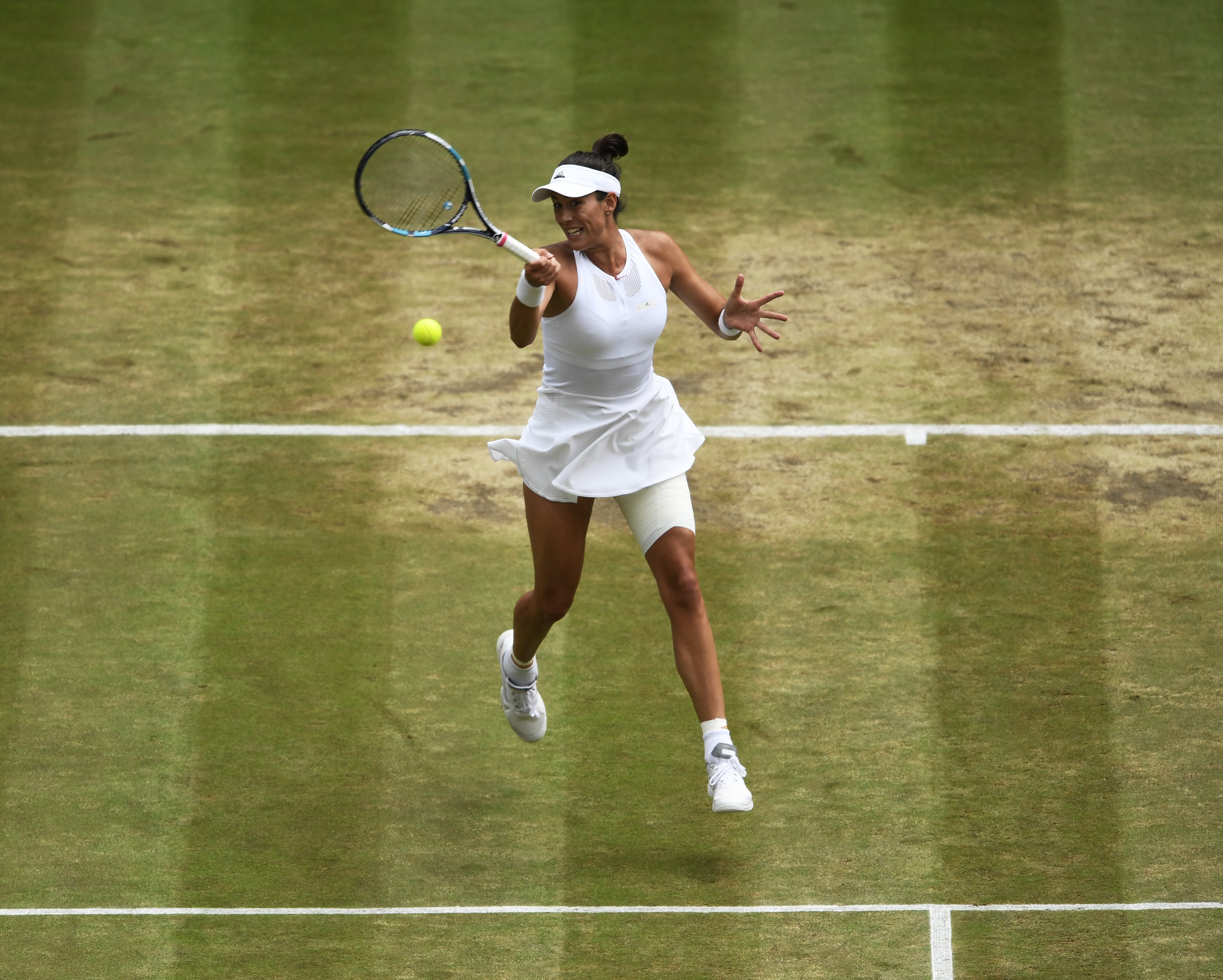 Pallissa de Muguruza per arribar a la seva segona final de Wimbledon