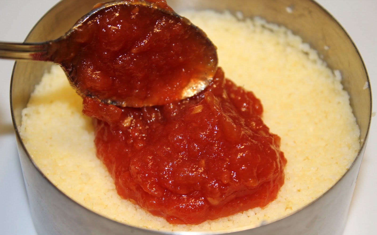 llom lluc sobre cous cous reduccio tomaquet malvasia sitges pas32