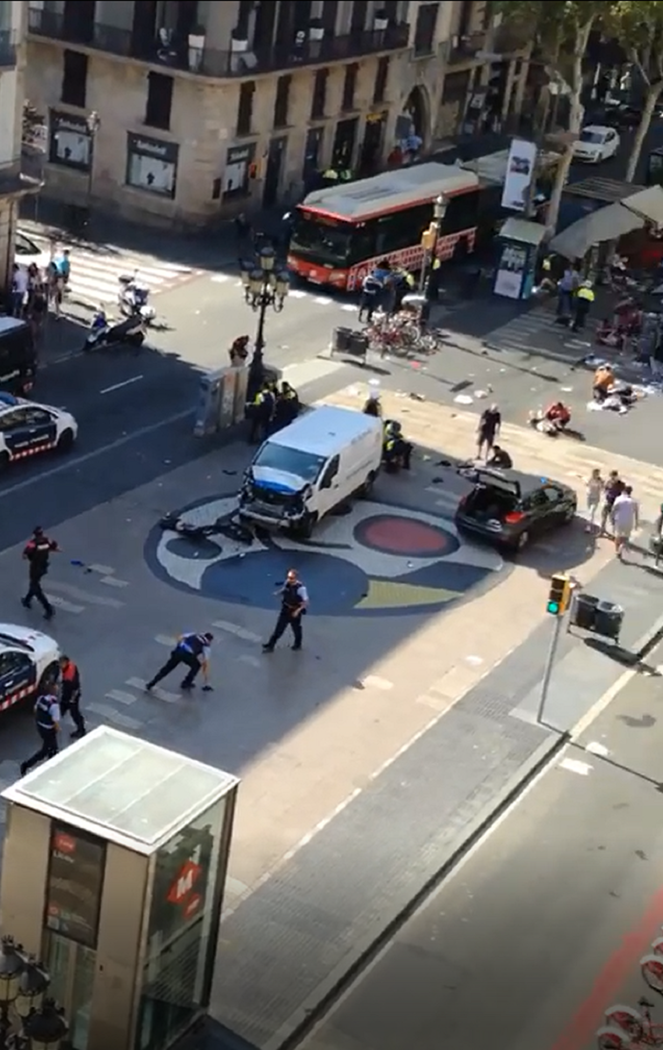 At least thirteen dead after van hits pedestrians on Barcelona's Rambla