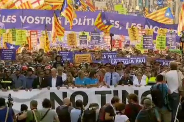 pancarta rei i estelades manifestació