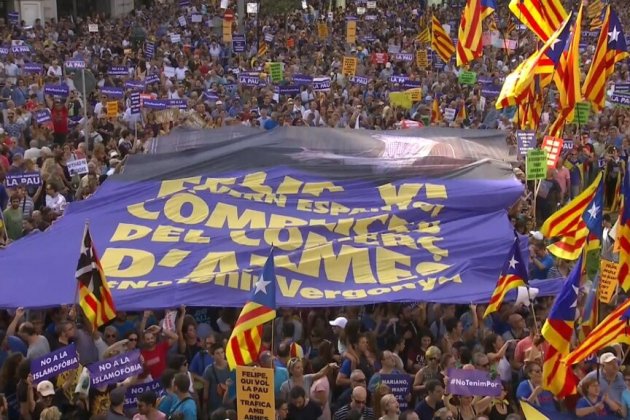 pancarta gengant Rei comerç armes