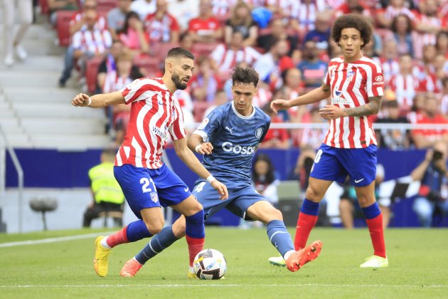 Yannick Carrasco Arnau Martinez Girona Atlético Madrid / Foto: EFE