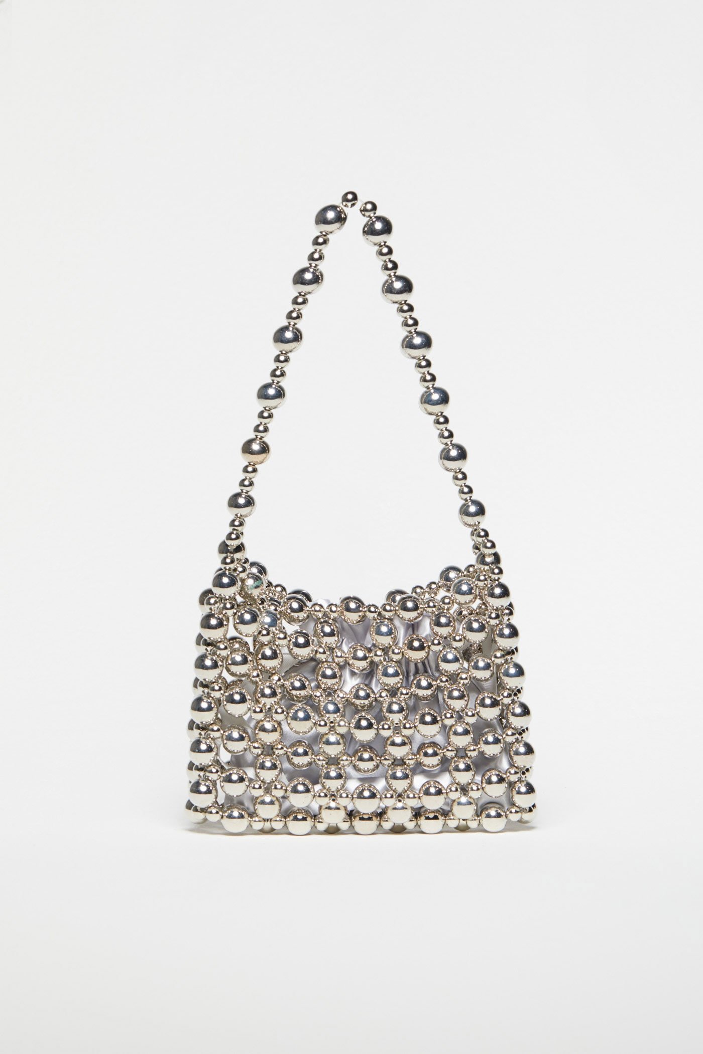 Bossa amb boles metàl·liques