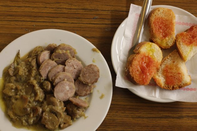 Mushrooms and sausage dish and pan con tomate Bar Brusi Mushrooms and sausage dish and pan con tomate Bar Brusi