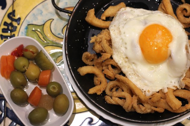 Curly calamari with a fried egg bar jai ca