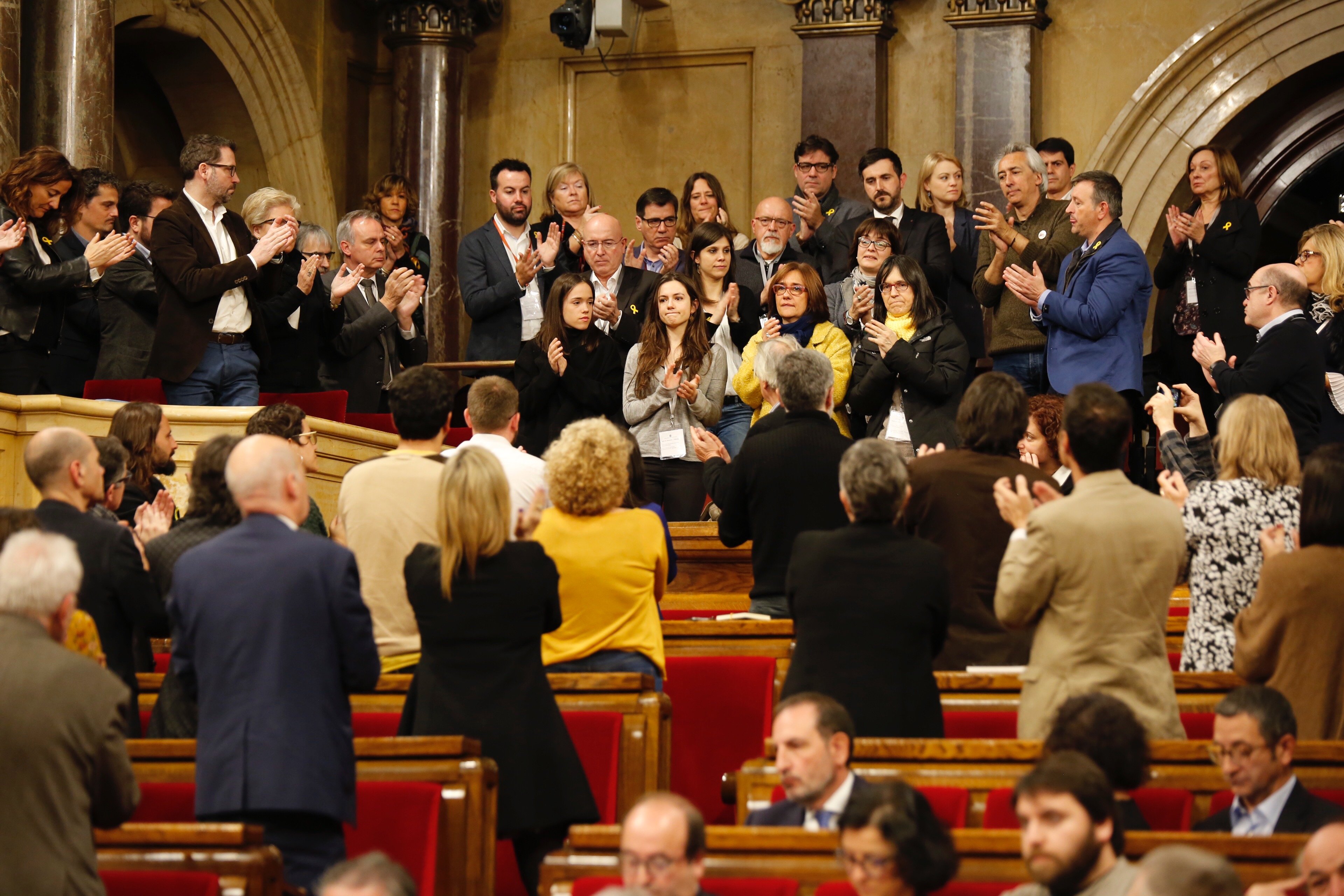 Catalan parliament converts disrupted session into tribute to jailed and exiled MPs