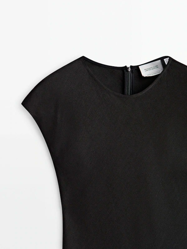 Vestit mesuro de lli negre Vestit mesuro de lli negre