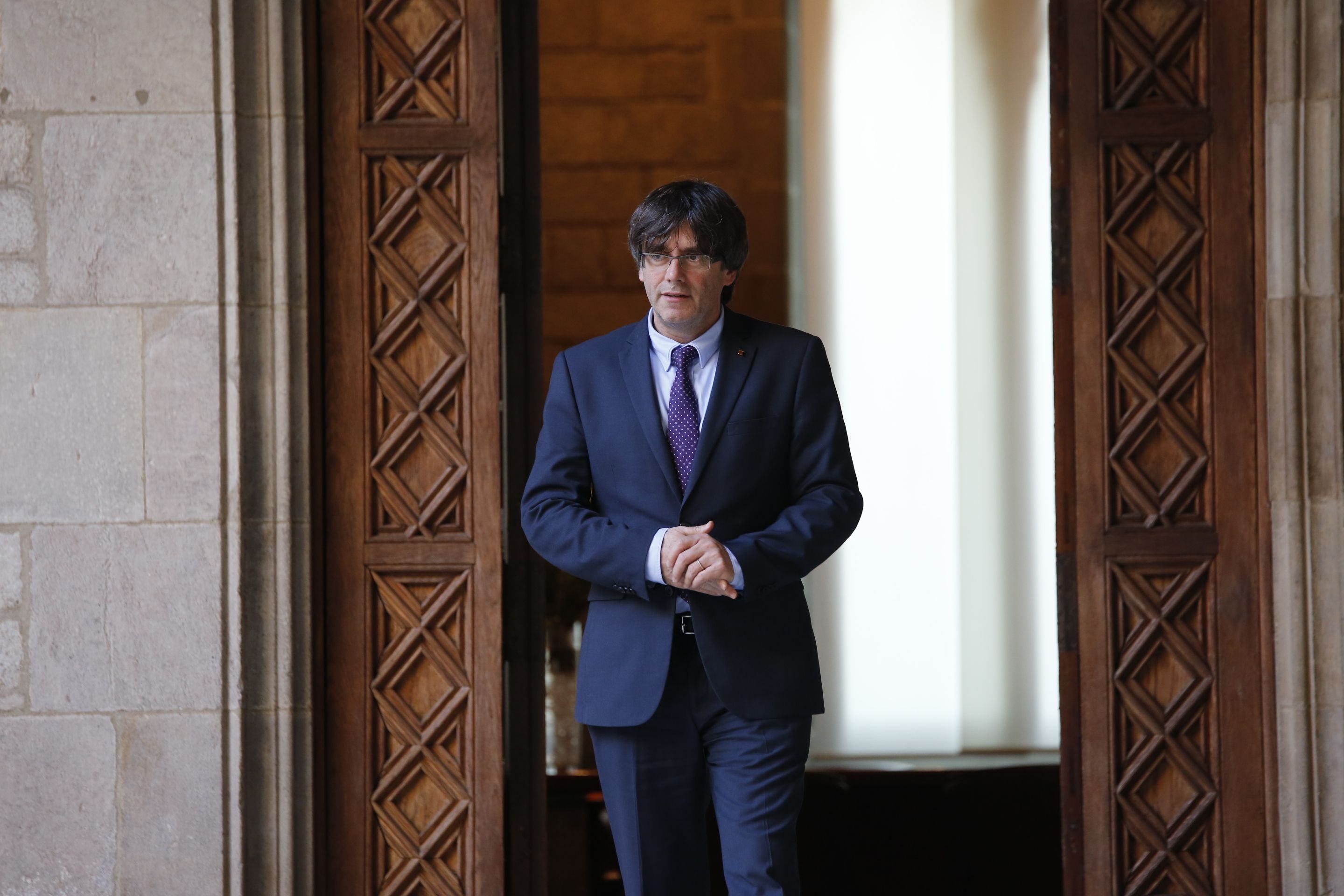 Puigdemont retreu en una reunió amb l'Empresa Familiar els seus silencis davant dels embats del PP