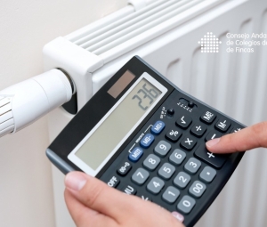 Una persona calcula el gasto en calefacción.