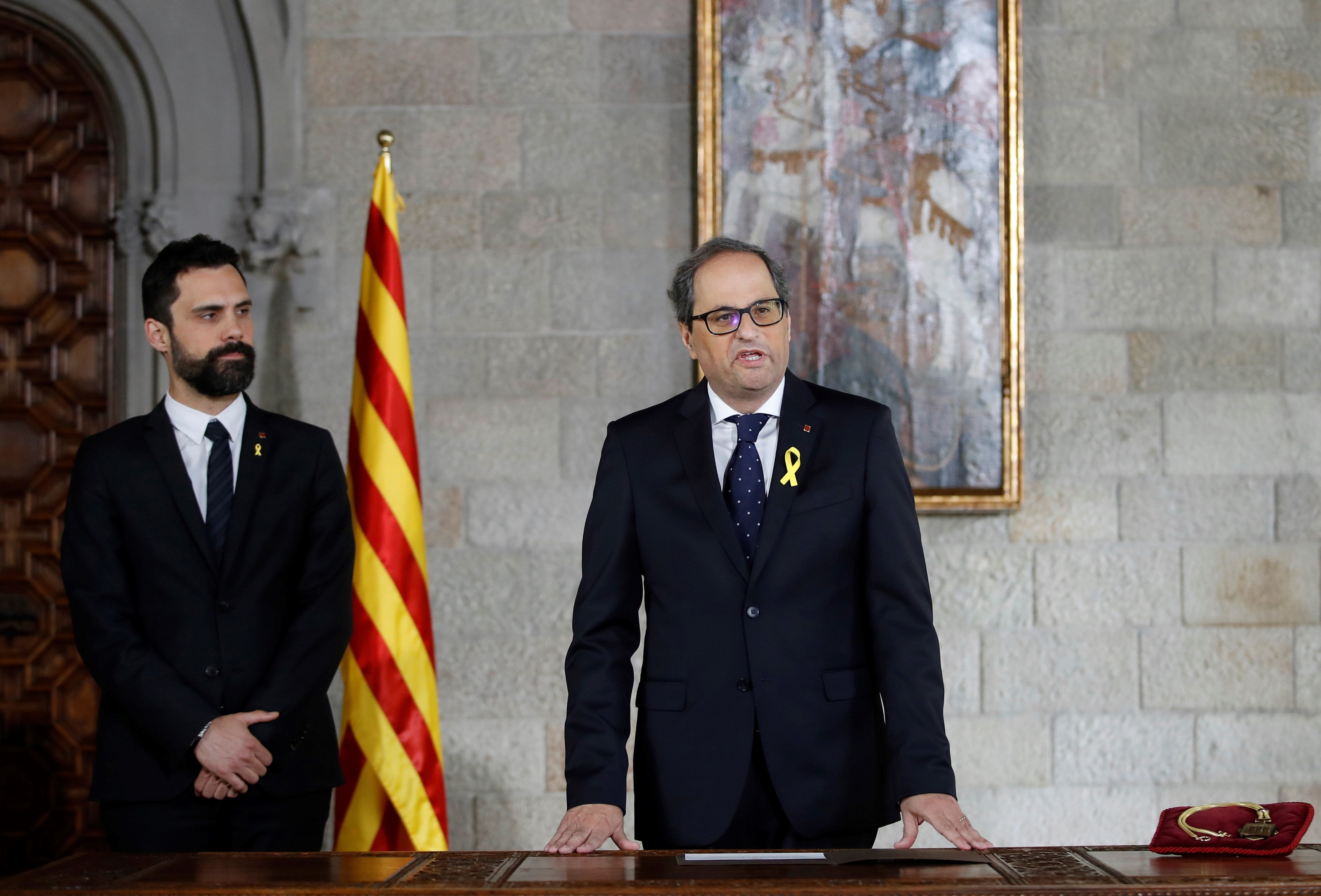 Quim Torra sworn in as Catalan president in simple ceremony to protest repression