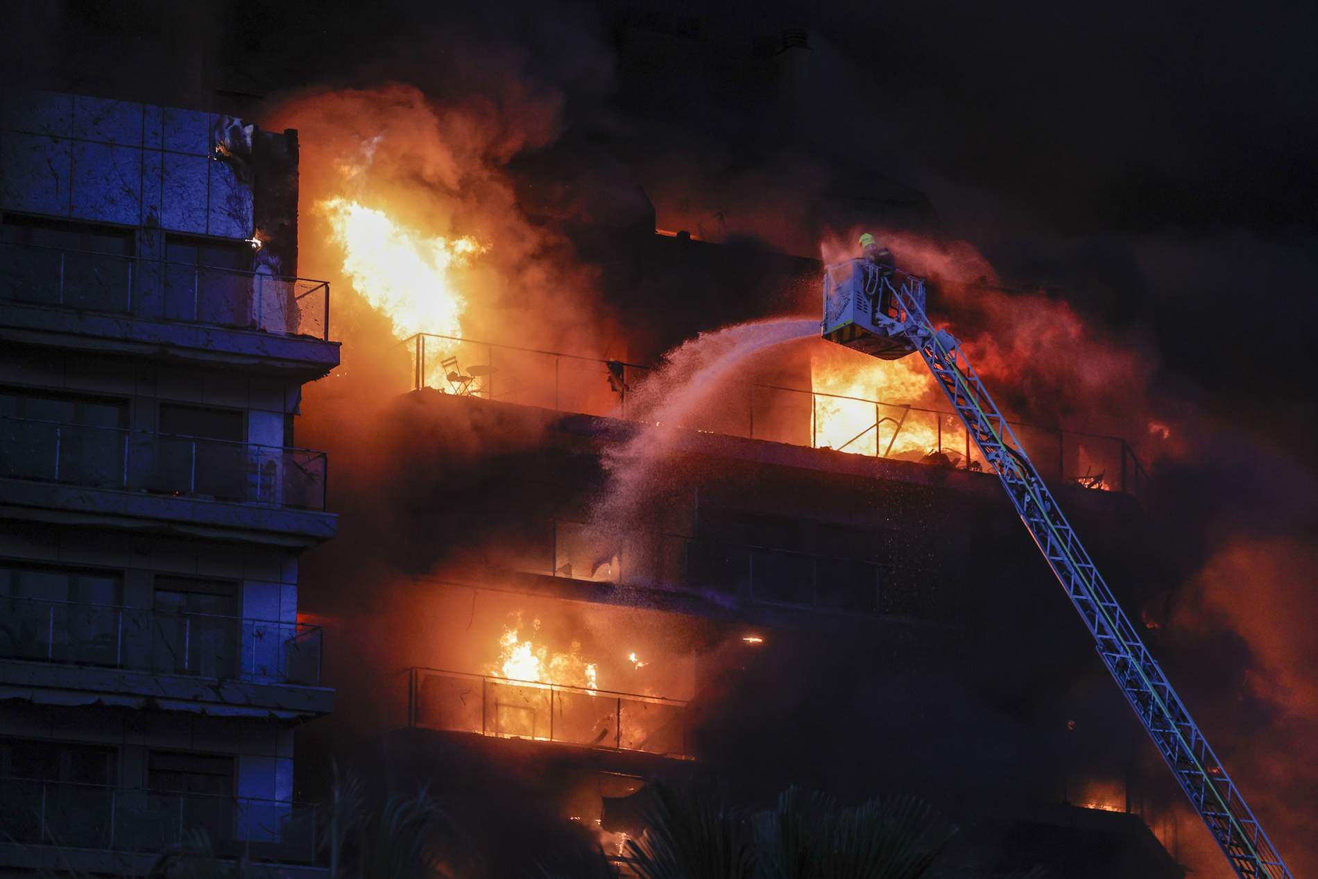 Four deaths confirmed and 19 missing after fire rips through 14-floor residential building in València