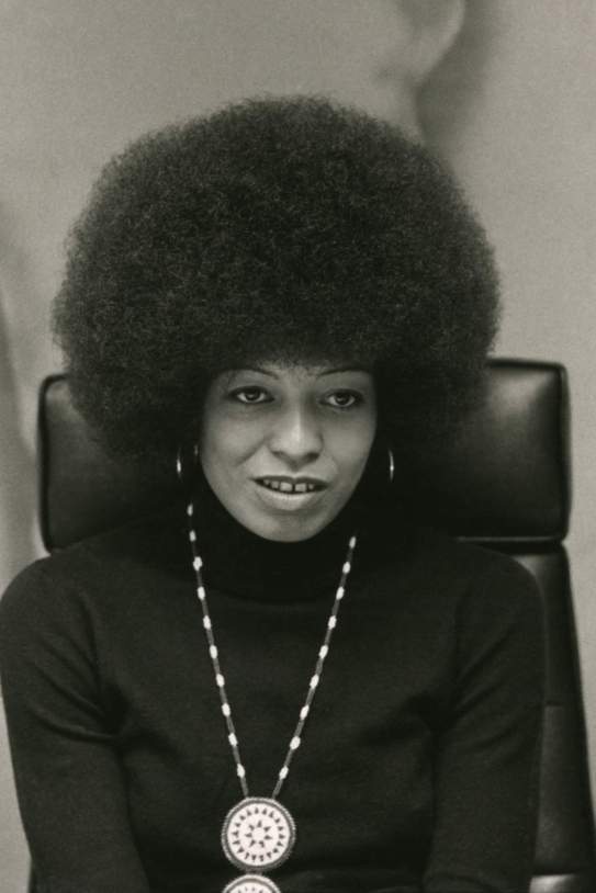 Angela Davis in a half length portrait by Bernard Gotfryd crop Angela Davis in a half length portrait by Bernard Gotfryd crop