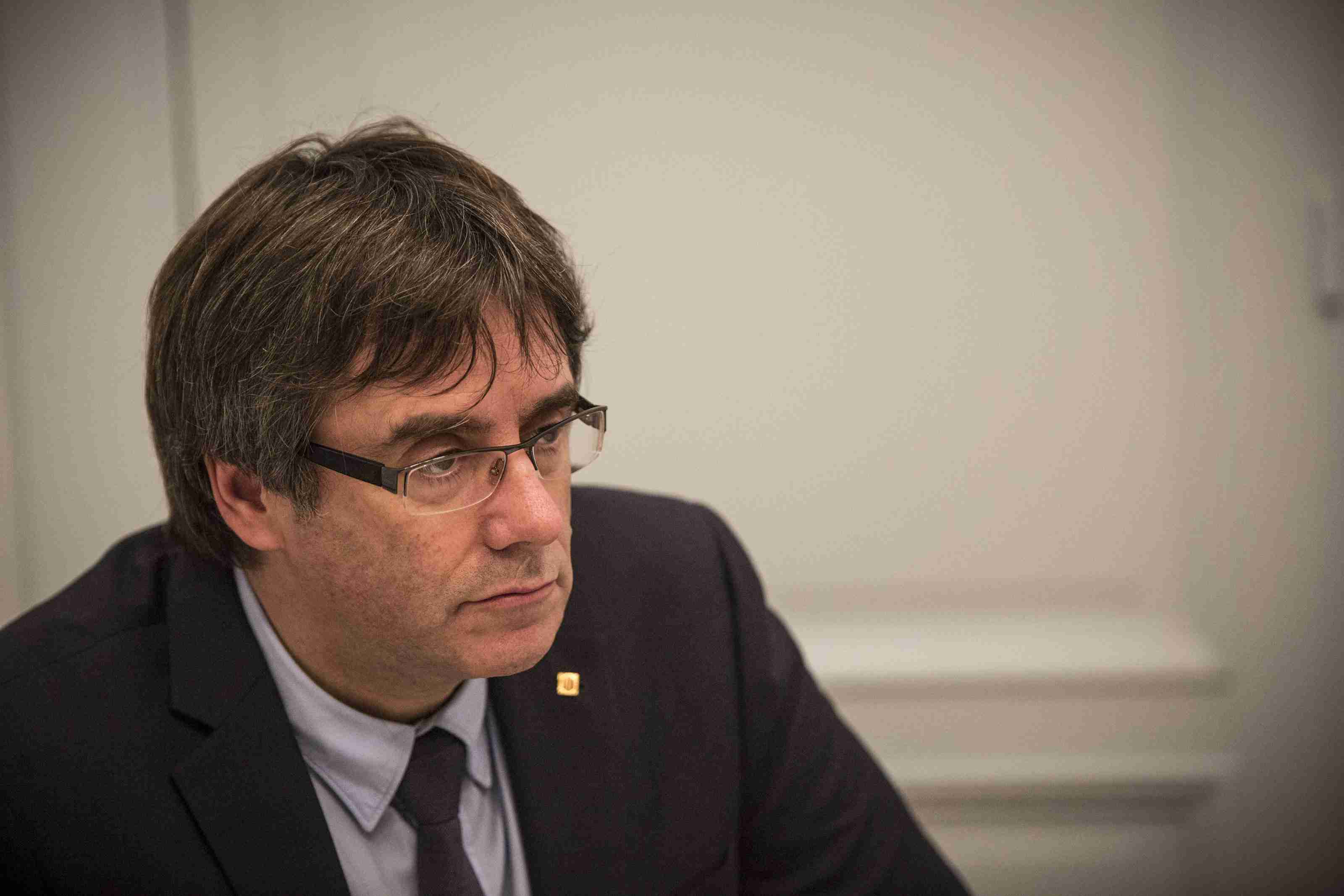 "In Geneva, we'll speak loud and clear," says Puigdemont, defying arrest threats