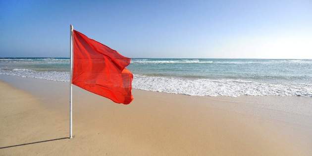 que significan las banderas rojas