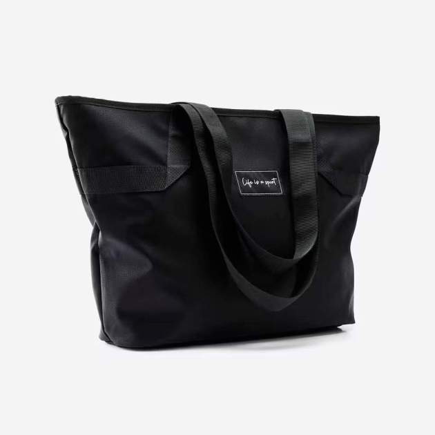Borsa esportiva negre efecte pell texturitzada DOMYOS1 Borsa esportiva negre efecte pell texturitzada DOMYOS1