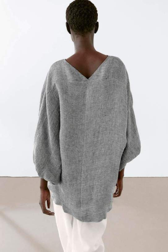 Vestit curt detall pispa 100% lli Vestit curt detall pispa 100% lli