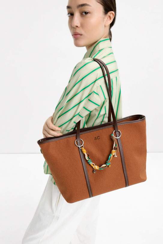 Bossa shopper en teixit amb penjoll