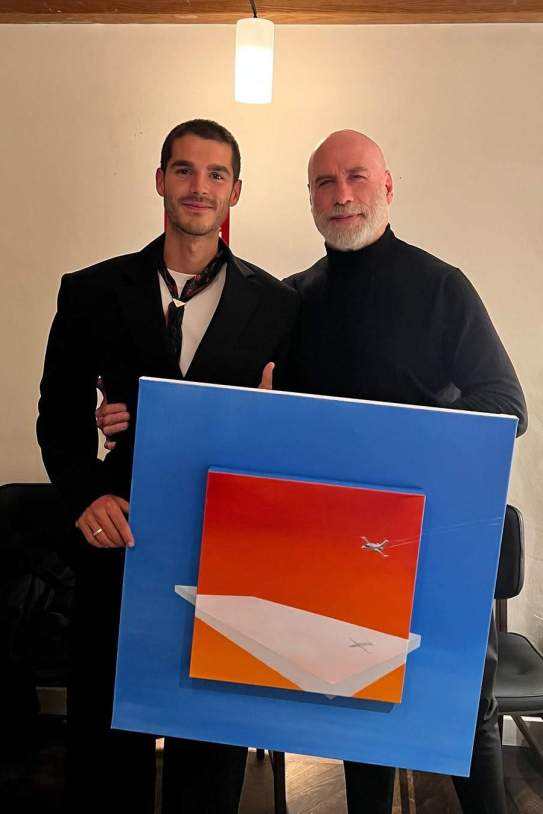 Mel con John Travolta / Instagram