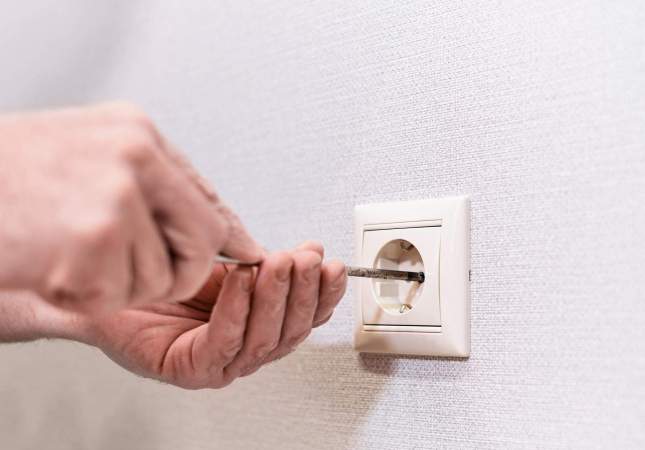 Imagen de un enchufe en un apartamento | Freepik 