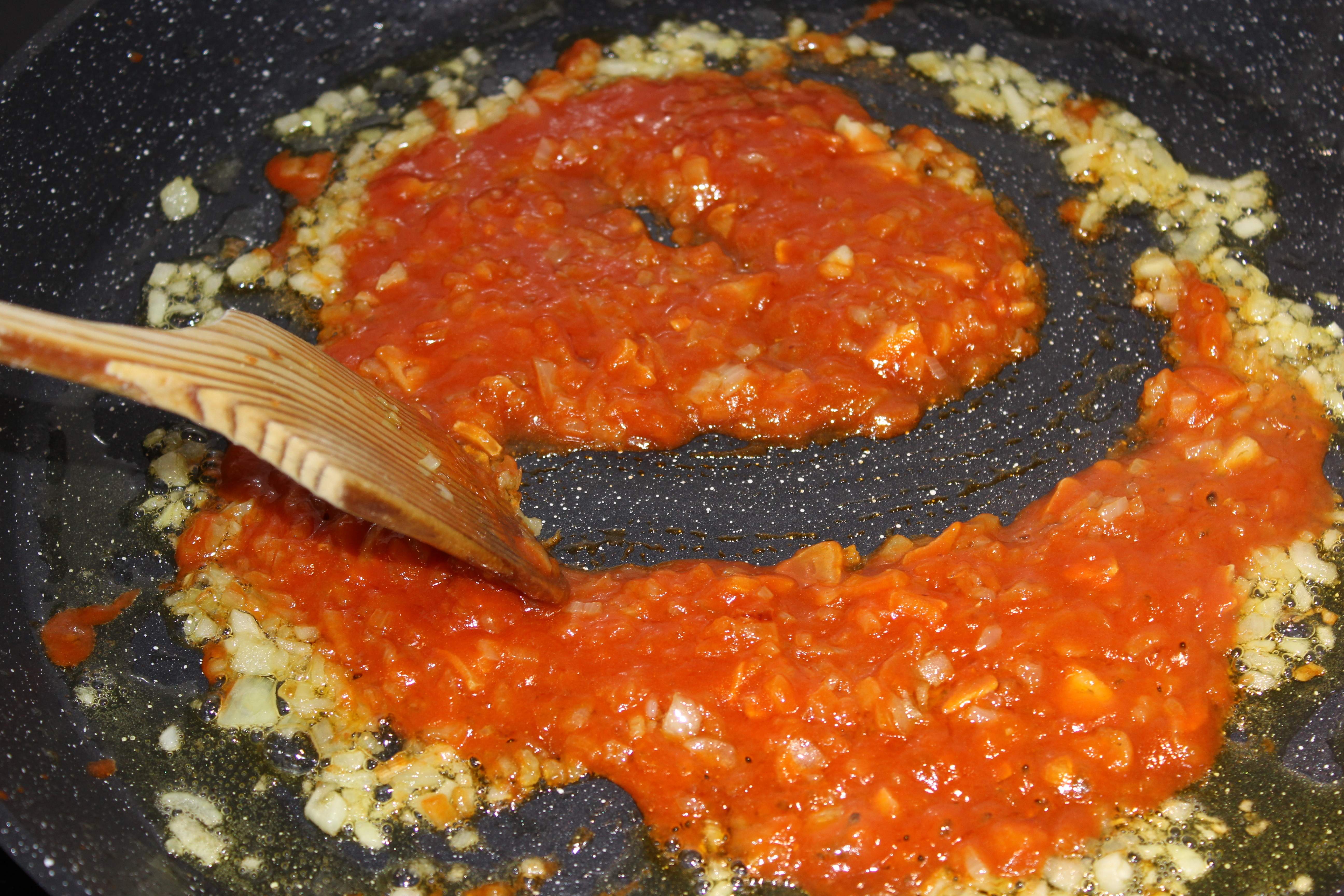 tirar tomàquet