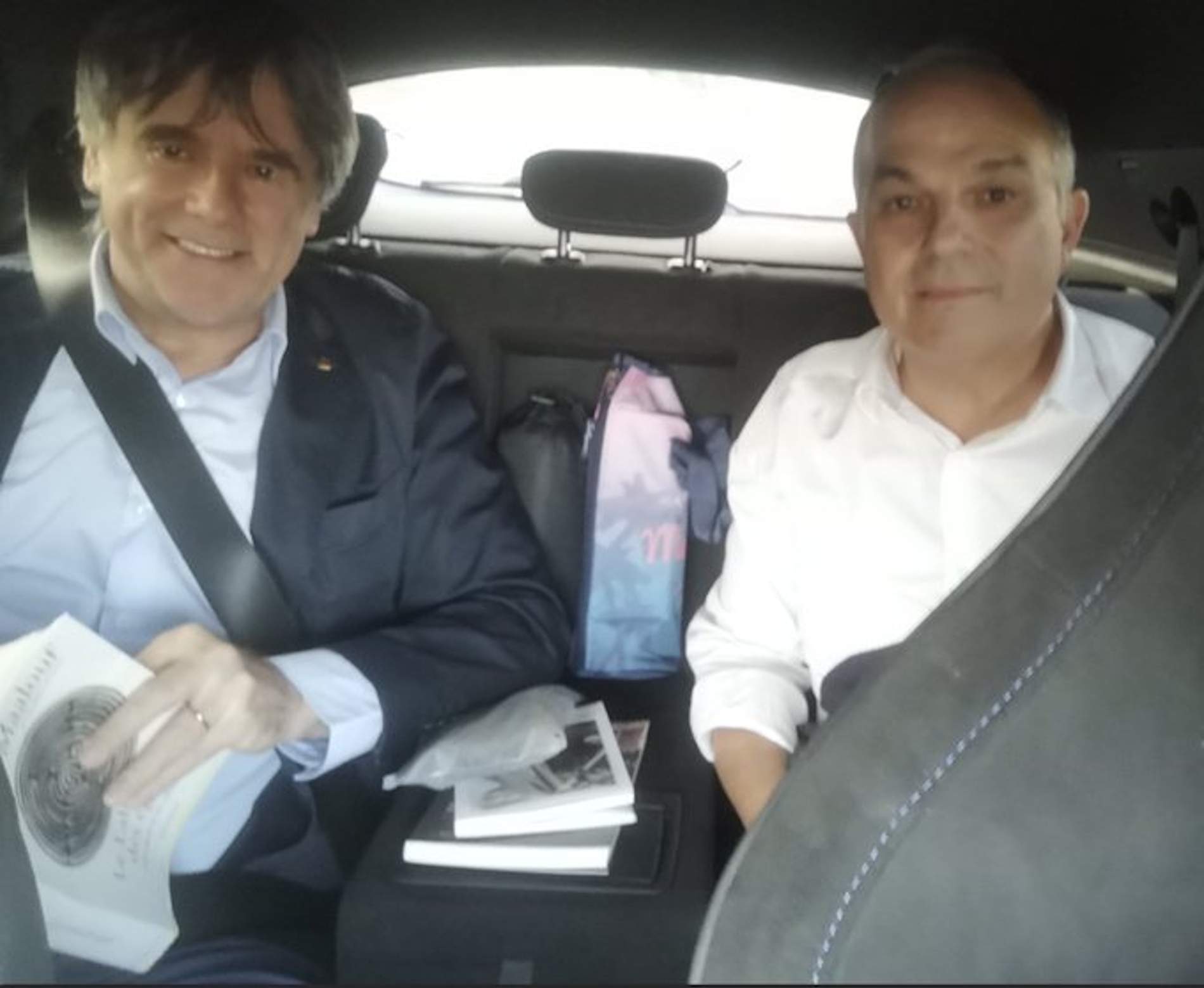 Carles Puigdemont i Jordi Turull, venint cap a Barcelona