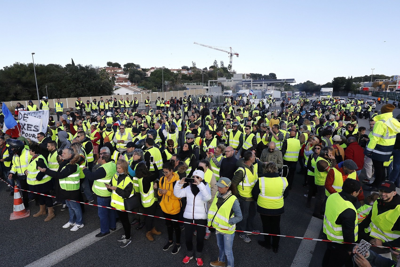 Over 240,000 protesters blockade French highways to oppose fuel tax rise
