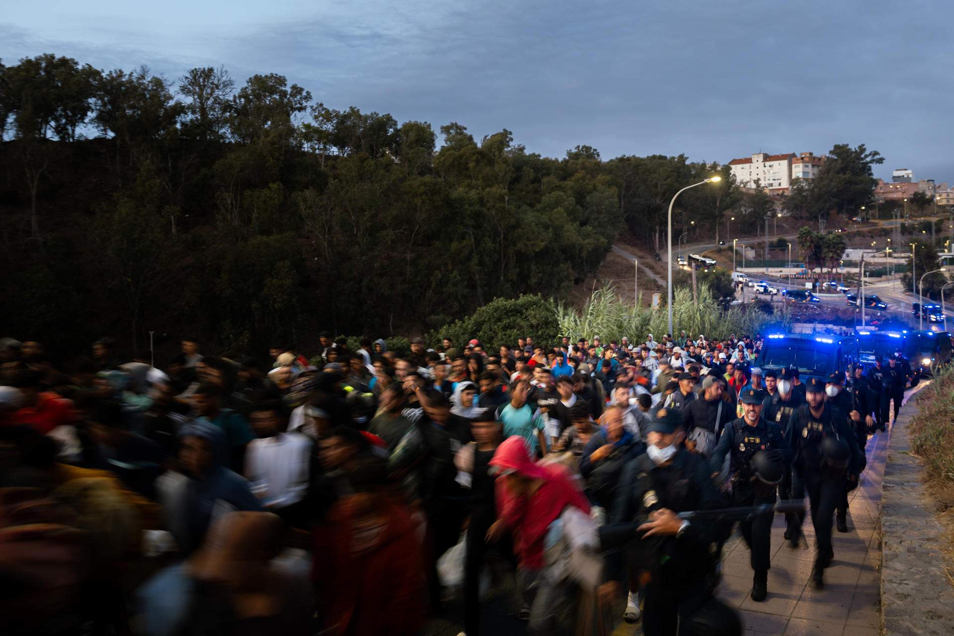 Trasllat migrants Ceuta / Efe