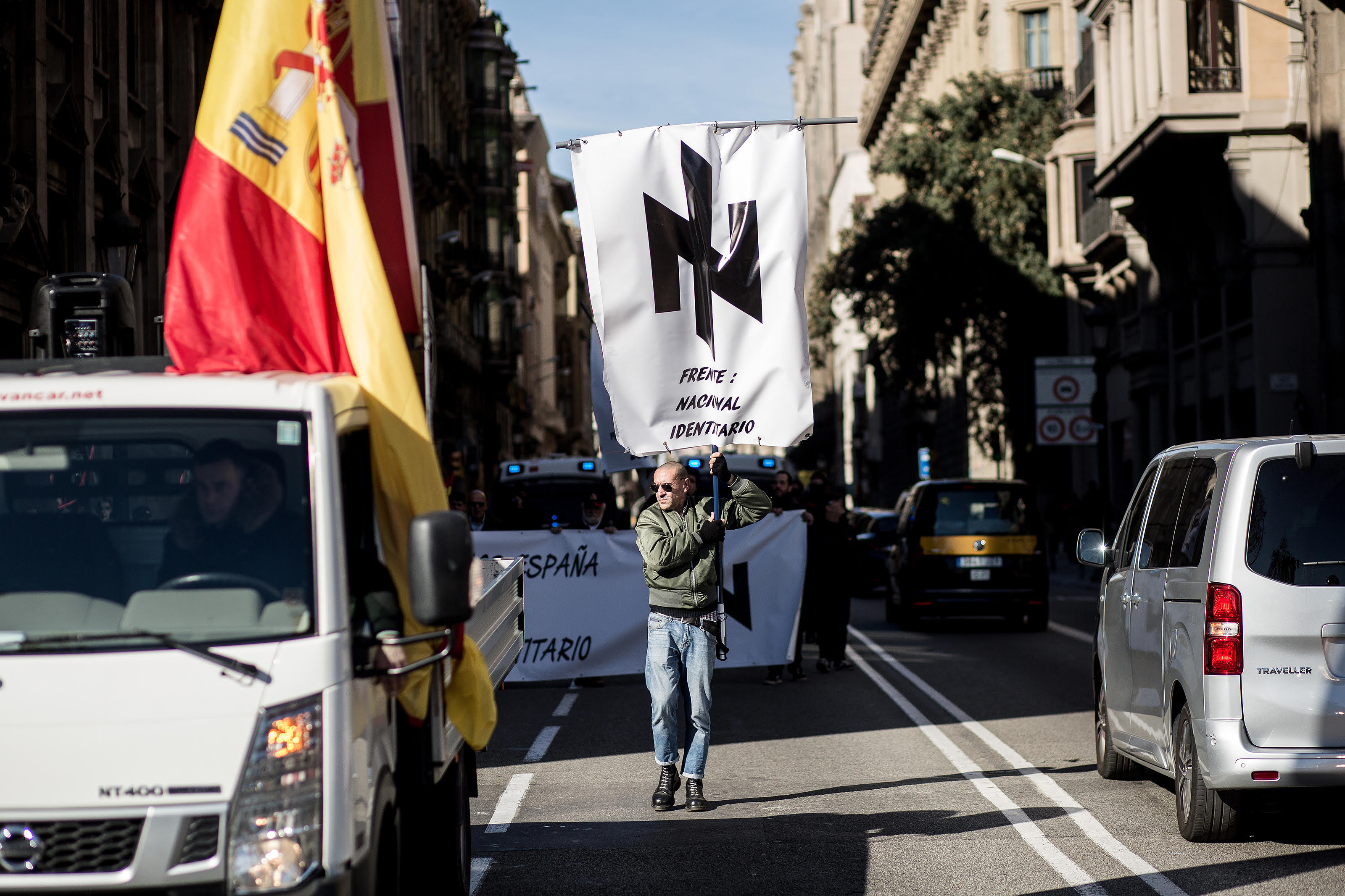 Extremists in Barcelona flaunt Nazi symbol banned in Germany