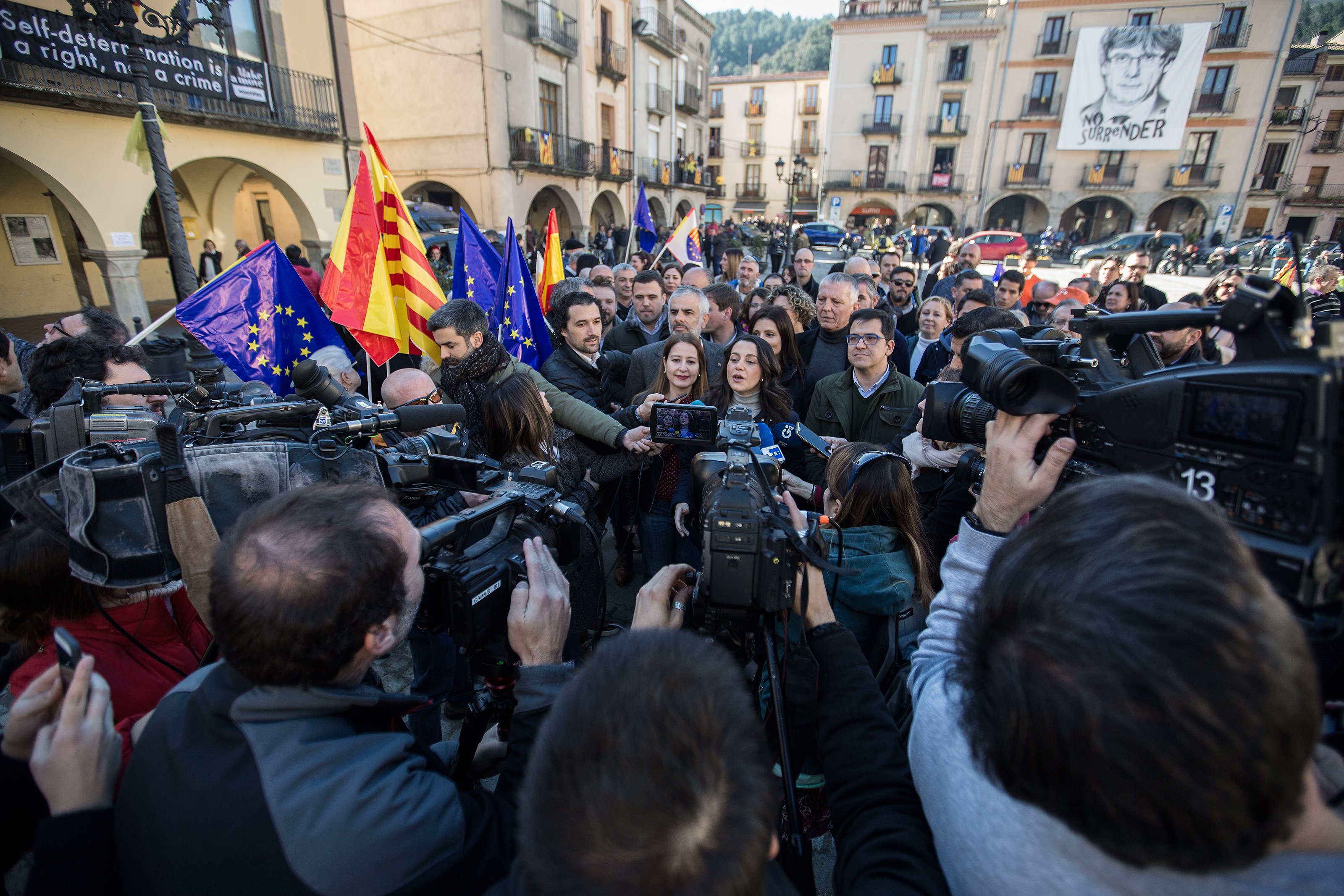 A Ciudadanos performance in Amer village, under Puigdemont's watchful gaze