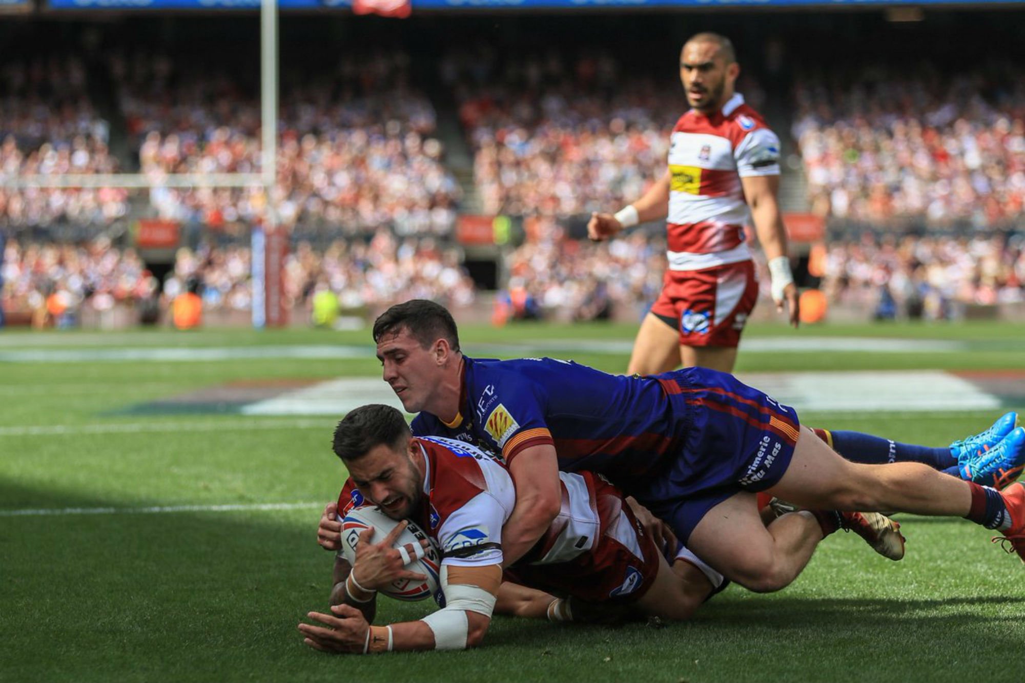 Els Dragons Catalans es contagien de la màgia del Camp Nou i apallissen els Wigan Warriors (33-16)