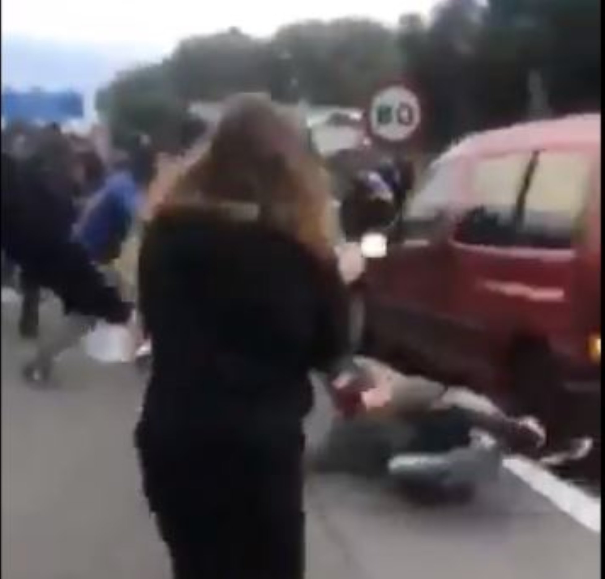 VIDEO: Catalan protesters hit by accelerating car as highway blockages continue